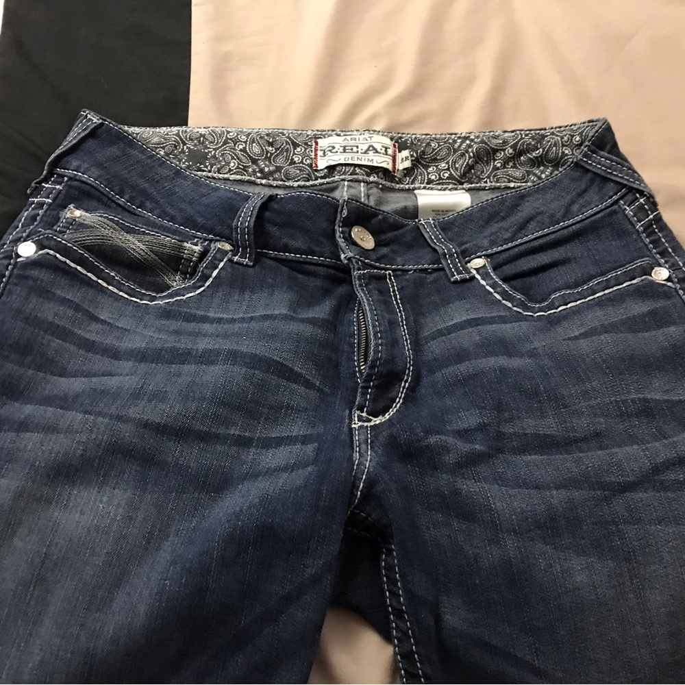 Ariat boot cut jeans.